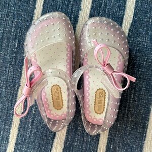 Mini Melissa clear Mary Jane’s with pink bow